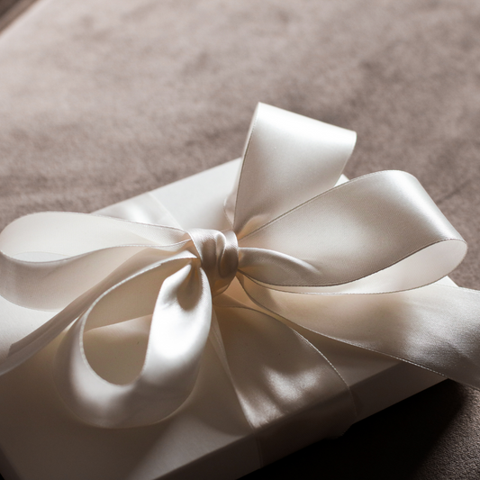 Present wrapped with silk bow